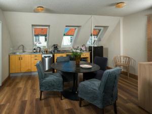 Η κουζίνα ή μικρή κουζίνα στο Attic Apartment Forelle With Panoramic River Views