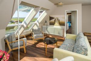 Χώρος καθιστικού στο Attic Apartment Forelle With Panoramic River Views