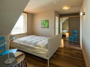 Ένα ή περισσότερα κρεβάτια σε δωμάτιο στο Attic Apartment Forelle With Panoramic River Views +7 φωτογραφίες