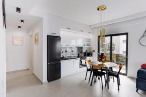 Η κουζίνα ή μικρή κουζίνα στο Golden Apartament Saranda