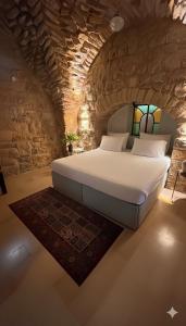 Ένα ή περισσότερα κρεβάτια σε δωμάτιο στο LEAH- botanical villa