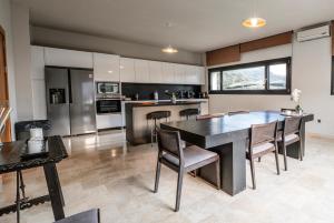 Køkken eller tekøkken på Villa Rural Zen by Hacienda Alfacara