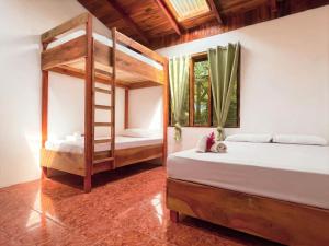 Postel nebo postele na pokoji v ubytování ICO Living Hostel + 10 fotografií