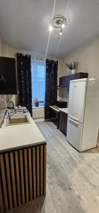 Kuchyň nebo kuchyňský kout v ubytování Apartament- mieszkanie blisko centrum