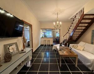 Μια τηλεόραση ή/και κέντρο ψυχαγωγίας στο Chalet con Pileta Bandurrias - Mar del Plata