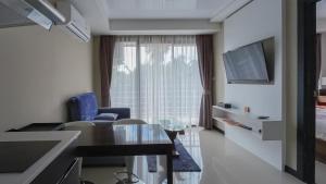 Μια τηλεόραση ή/και κέντρο ψυχαγωγίας στο Квартира