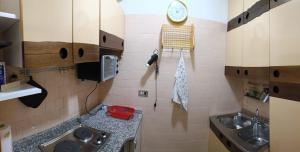 Køkken eller tekøkken på Monolocale residence Paradiso Aremogna