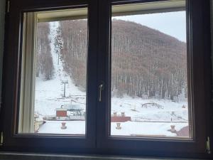 Monolocale residence Paradiso Aremogna om vinteren