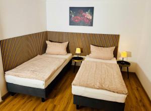 Ένα ή περισσότερα κρεβάτια σε δωμάτιο στο Gästehaus Jekle