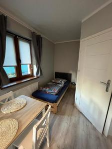 En eller flere senge i et værelse på Beskidzka 25a