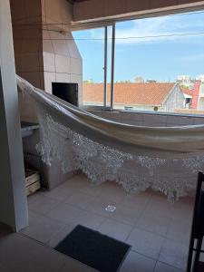 Un balcon sau o terasă la Triplex no litoral