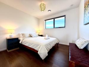 Ένα ή περισσότερα κρεβάτια σε δωμάτιο στο Dansons on The Hill