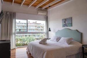 Ένα ή περισσότερα κρεβάτια σε δωμάτιο στο Casa Bikini +70 φωτογραφίες