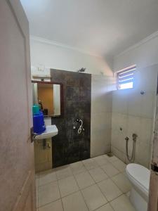 Koupelna v ubytování Capital Plaza Residency and conventional center