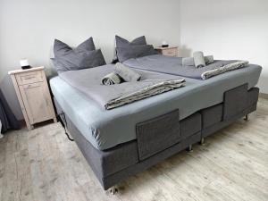 Ένα ή περισσότερα κρεβάτια σε δωμάτιο στο Apartments Waldbronn