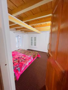 Postel nebo postele na pokoji v ubytování Mountain Majesty