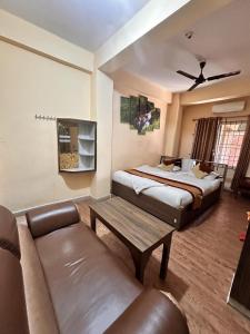 Ένα ή περισσότερα κρεβάτια σε δωμάτιο στο HOTEL OPERA Deluxe