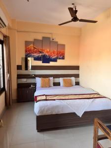 Ένα ή περισσότερα κρεβάτια σε δωμάτιο στο HOTEL OPERA Deluxe