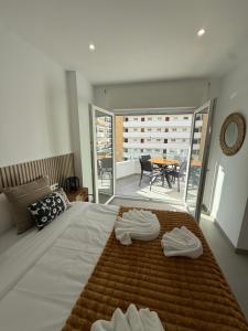 Ένα ή περισσότερα κρεβάτια σε δωμάτιο στο Apartamento Ronda III +87 φωτογραφίες