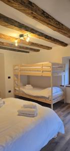 Ένα ή περισσότερα κρεβάτια σε δωμάτιο στο Rifugio Kristine