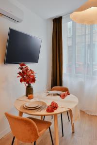 Μια τηλεόραση ή/και κέντρο ψυχαγωγίας στο Cœur de ville Le Petit Châteauvert