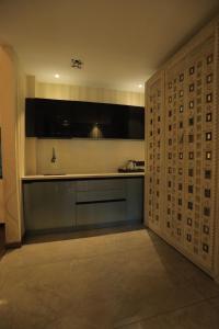 Η κουζίνα ή μικρή κουζίνα στο Hotel The Royal Venetian