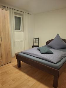 Postel nebo postele na pokoji v ubytování Perfekt für Firmen, Pendler, berufliche Übernachtungen