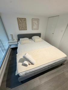 En eller flere senge i et værelse på Le Cosy de Croix-rousse