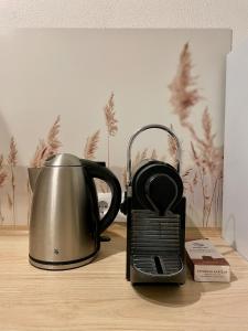 Принадлежности для чая и кофе в Moderne Wohnung nahe Hockenheimring für bis zu 8 Personen