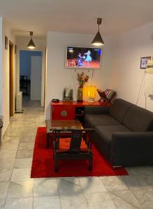 Et tv og/eller underholdning på Grand Appartement F4 bien situé pour visiter Paris