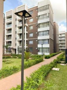 a street light in front of a building at Cozystays by Vee Near JKIA in Nairobi