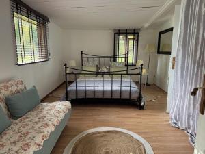 Postel nebo postele na pokoji v ubytování gite du Domaine des cigales