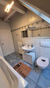 Ванная комната в Ferienwohnung Ankerplatz