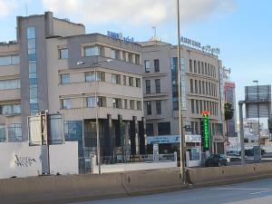 a building on the side of a city street at Dar Mima in Tunis