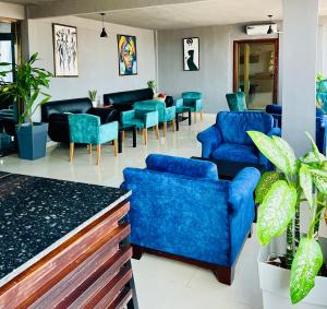 Χώρος καθιστικού στο Tris Estates Hotel & Suites