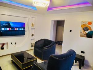 Μια τηλεόραση ή/και κέντρο ψυχαγωγίας στο Onpoint luxury Apartment