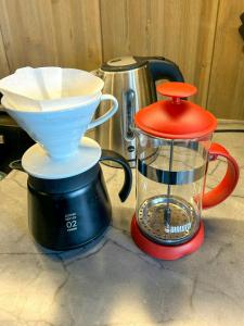a blender sitting on a counter next to a coffee maker at Modern Cabin By The Ski Trails At Fagerhøy in Sør-Fron
