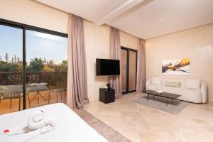 TV a/nebo společenská místnost v ubytování Palais Nouhass