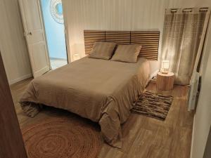 Ένα ή περισσότερα κρεβάτια σε δωμάτιο στο Cocooning