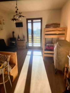 Una cama o camas en una habitación de Casetta di montagna