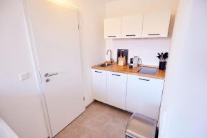 Kuchyň nebo kuchyňský kout v ubytování Sonnhof Apartments Tegernsee - zentral und perfekt für Urlaub & Arbeit