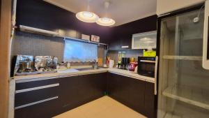 Kuchyň nebo kuchyňský kout v ubytování Nick's home01 + 2 fotografie