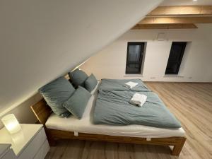 Postel nebo postele na pokoji v ubytování MainSpessartBlick