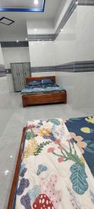 En eller flere senge i et værelse på Arasam Homestay Bình An + 8 billeder