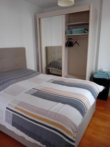 Postel nebo postele na pokoji v ubytování FORUM 134, 36 m2 en plein centre ville