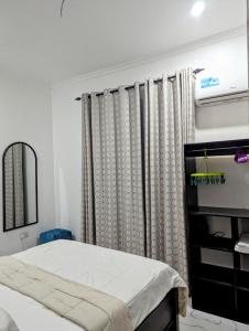 Ένα ή περισσότερα κρεβάτια σε δωμάτιο στο BSM Residence