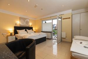 Giường trong phòng chung tại Business Pension Gasper