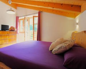 Ένα ή περισσότερα κρεβάτια σε δωμάτιο στο MASO MOLINI