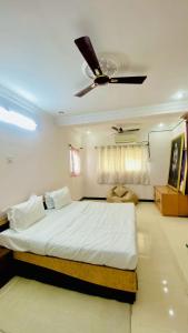 En eller flere senge i et værelse på Sai vacation Home