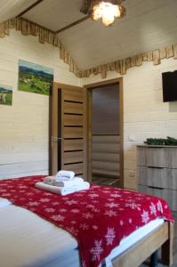 Ένα ή περισσότερα κρεβάτια σε δωμάτιο στο Садиба Кичера Еко